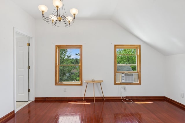 16 Hazel Ave, Livingston, NJ 07039 - additional living space featuring hardwood / wood-style floors, a chandelier, vaulted ceiling, cooling unit, and baseboards