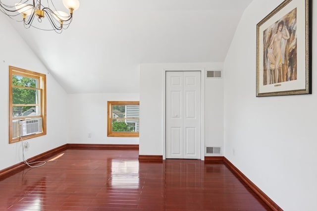 16 Hazel Ave, Livingston, NJ 07039 - additional living space featuring lofted ceiling, a chandelier, wood finished floors, baseboards, and cooling unit