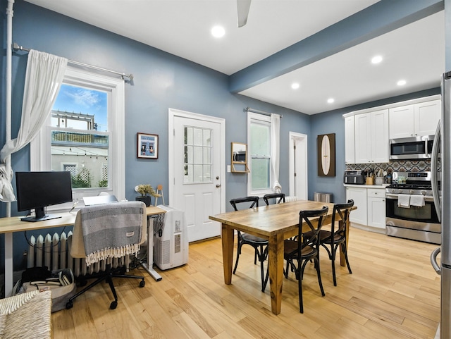 75 Reservoir Ave, Jersey City, NJ 07307 - dining space featuring light wood-style floors, a desk, recessed lighting, and a ceiling fan