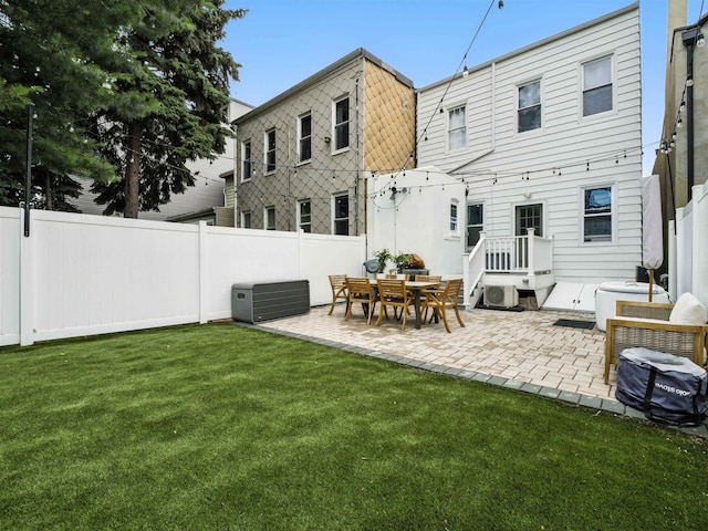 75 Reservoir Ave, Jersey City, NJ 07307 - rear view of house with a patio