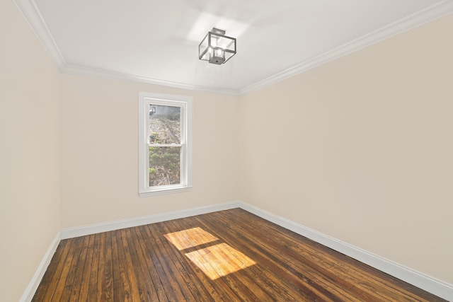 unfurnished room with dark hardwood / wood-style flooring and crown molding