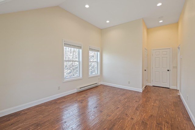 unfurnished room with high vaulted ceiling, a baseboard radiator, and wood-type flooring