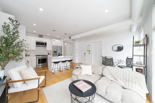 414 1st St Unit 5, Jersey City, NJ 07302 - living area featuring recessed lighting and light wood-style floors