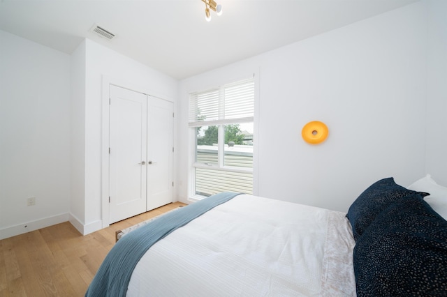 414 1st St Unit 5, Jersey City, NJ 07302 - bedroom featuring light wood-type flooring and a closet