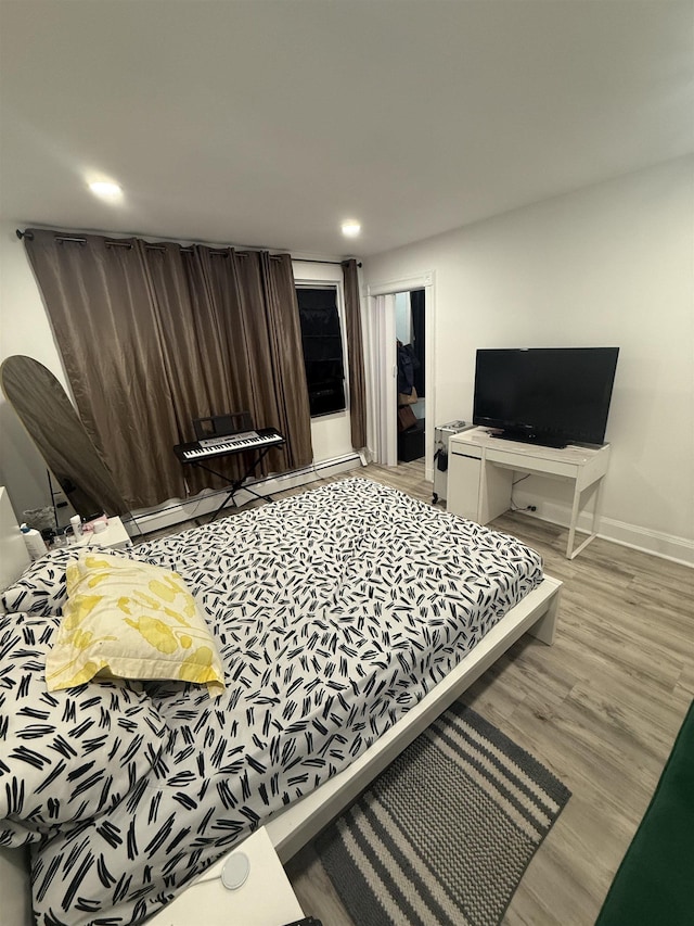 4312 Cottage St, North Bergen, NJ 07047 - bedroom with recessed lighting and wood finished floors