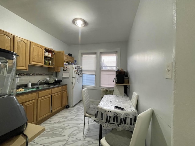 33 Clerk St, Jersey City, NJ 07305 - kitchen featuring freestanding refrigerator, light marble finish flooring, decorative backsplash, open shelves, and dark countertops