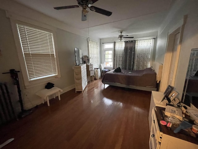 33 Clerk St, Jersey City, NJ 07305 - bedroom with dark wood-type flooring and baseboards
