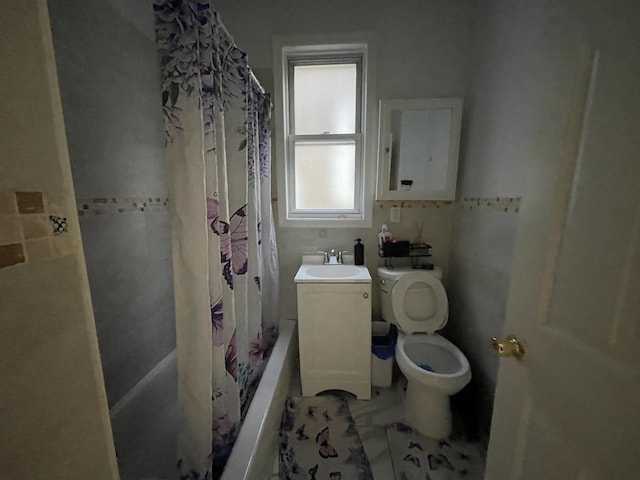 33 Clerk St, Jersey City, NJ 07305 - full bath with a sink, toilet, shower / bathtub combination with curtain, and tile walls
