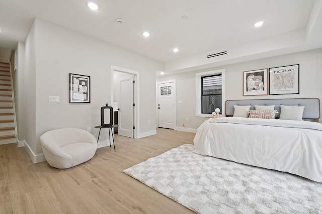 bedroom with light hardwood / wood-style flooring