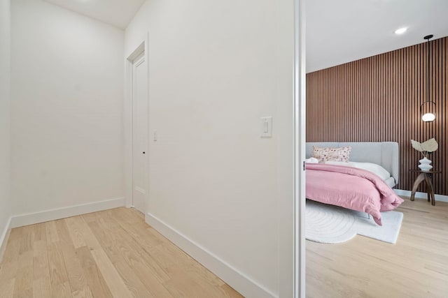 bedroom with light hardwood / wood-style floors