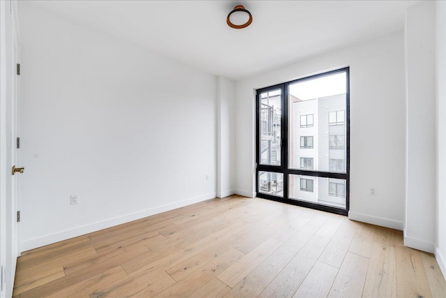 418 Monroe St Unit 201, Hoboken, NJ 07030 - empty room featuring light wood finished floors and baseboards