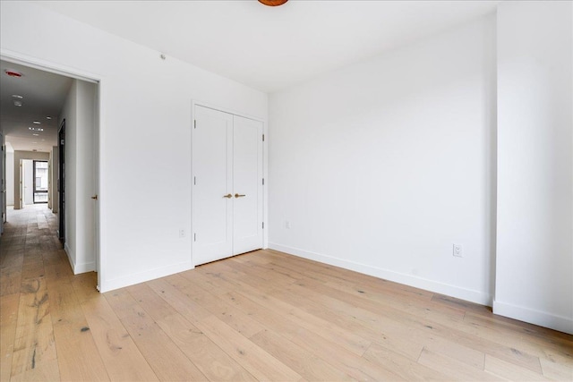 418 Monroe St Unit 201, Hoboken, NJ 07030 - unfurnished bedroom with light wood-type flooring and baseboards