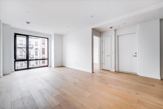 418 Monroe St Unit 201, Hoboken, NJ 07030 - unfurnished room featuring light wood-style flooring and baseboards