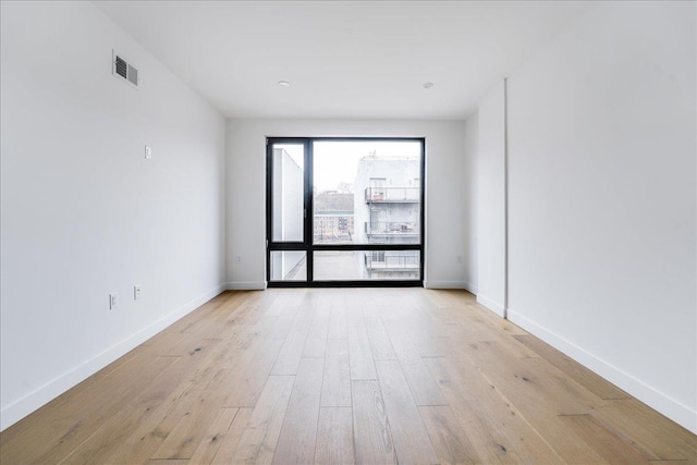 418 Monroe St Unit 201, Hoboken, NJ 07030 - unfurnished room with baseboards and light wood-style flooring