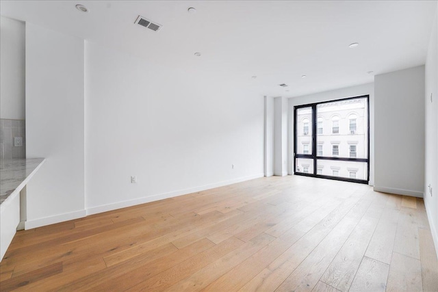 418 Monroe St Unit 201, Hoboken, NJ 07030 - empty room featuring light wood finished floors and baseboards