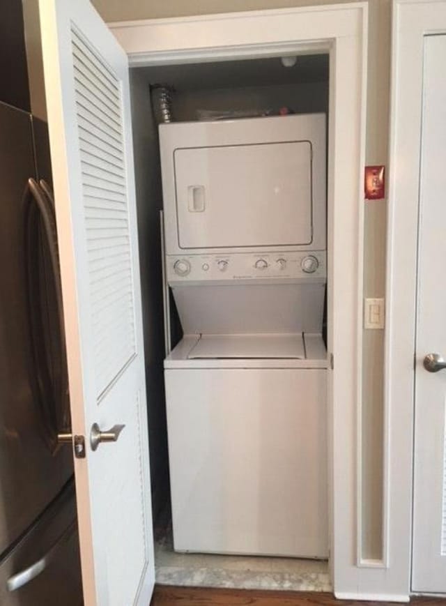 635 6th St Unit 2C, Hoboken, NJ 07030 - laundry room featuring stacked washer / drying machine