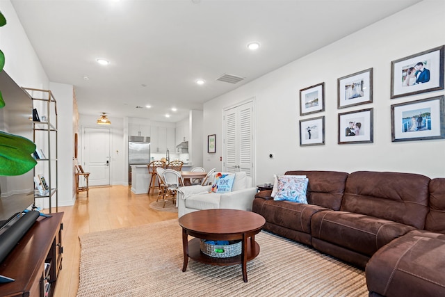 living room featuring light hardwood / wood-style flooring