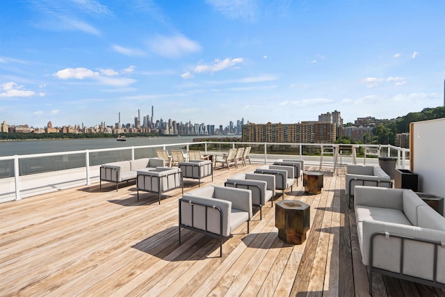 wooden terrace featuring an outdoor hangout area