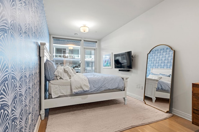 bedroom featuring hardwood / wood-style flooring