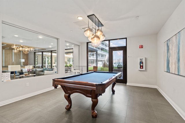 rec room with billiards and a healthy amount of sunlight