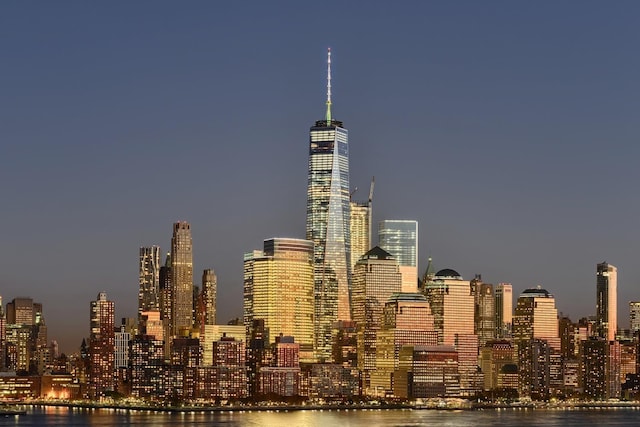 property's view of city with a water view