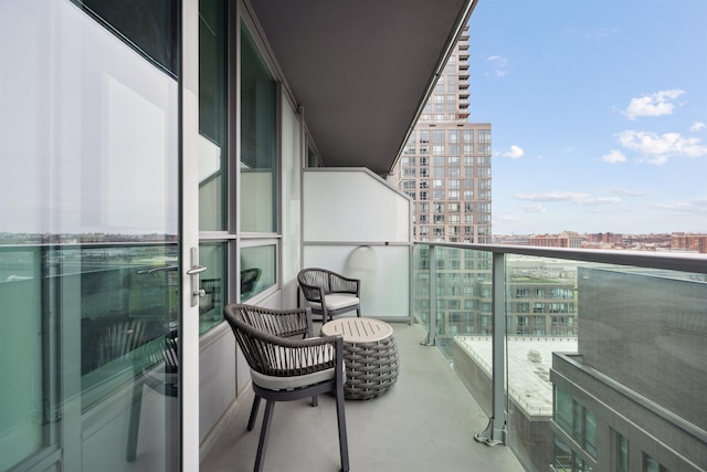 balcony featuring a city view