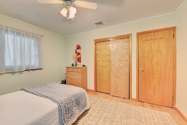 76 Central Ave, Secaucus, NJ 07094 - bedroom with light wood-style flooring, crown molding, and a ceiling fan