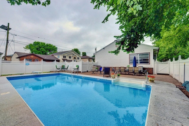 76 Central Ave, Secaucus, NJ 07094 - view of pool with a fenced backyard, a patio, and a diving board
