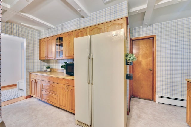 76 Central Ave, Secaucus, NJ 07094 - kitchen with freestanding refrigerator, wallpapered walls, beam ceiling, light carpet, and light countertops