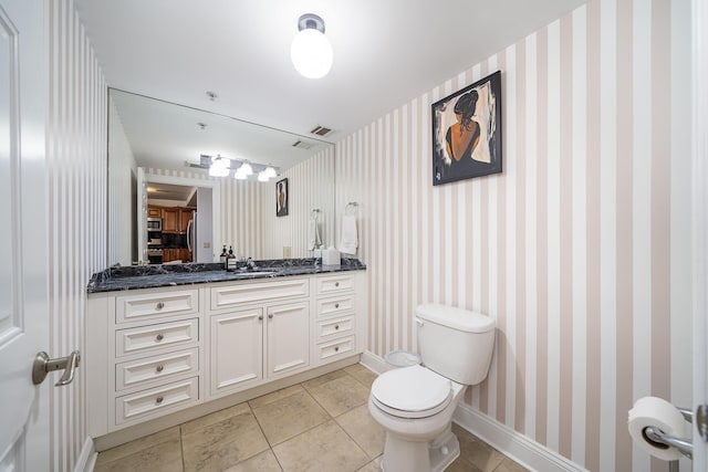45 Broadway Unit 302, Jersey City, NJ 07306 - bathroom featuring vanity, tile patterned flooring, and wallpapered walls