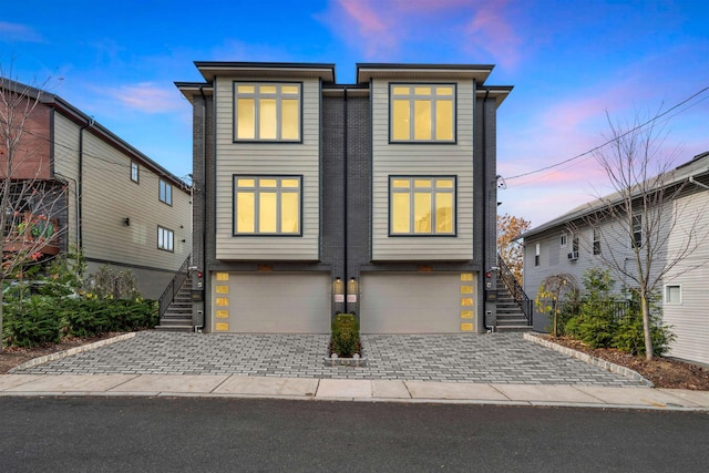 view of front of home with a garage