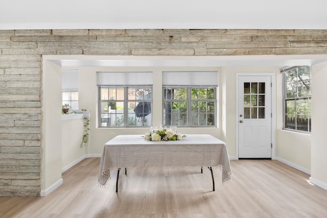 80 E 24th St, Bayonne, NJ 07002 - dining area featuring light wood-style floors, healthy amount of natural light, and baseboards