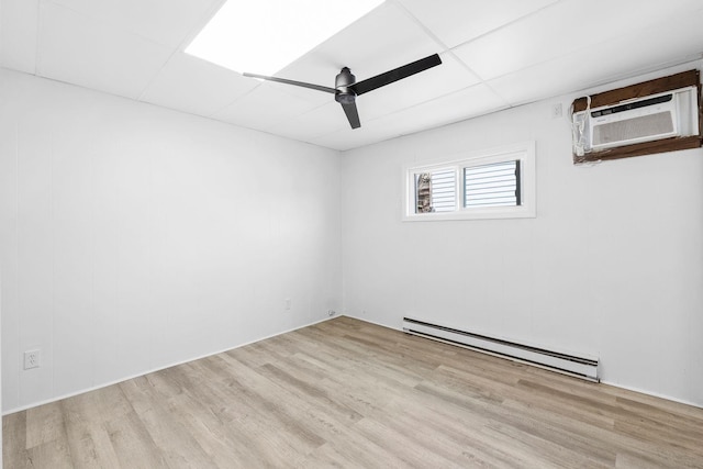 80 E 24th St, Bayonne, NJ 07002 - unfurnished room featuring baseboard heating, wood finished floors, and ceiling fan