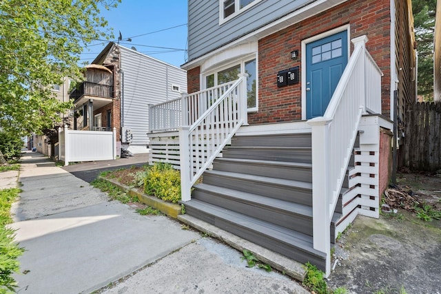 80 E 24th St, Bayonne, NJ 07002 - view of exterior entry with brick siding