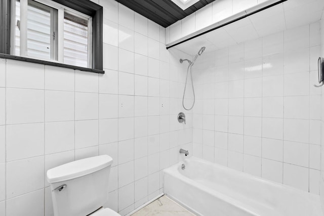 80 E 24th St, Bayonne, NJ 07002 - full bath with toilet,  shower combination, tile walls, and marble look tile flooring