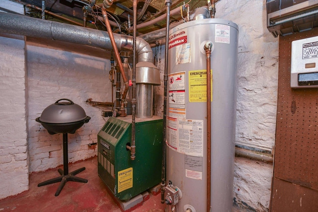 utility room featuring a heating unit and water heater