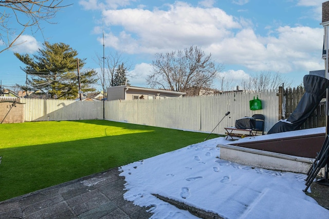 view of yard with a fenced backyard