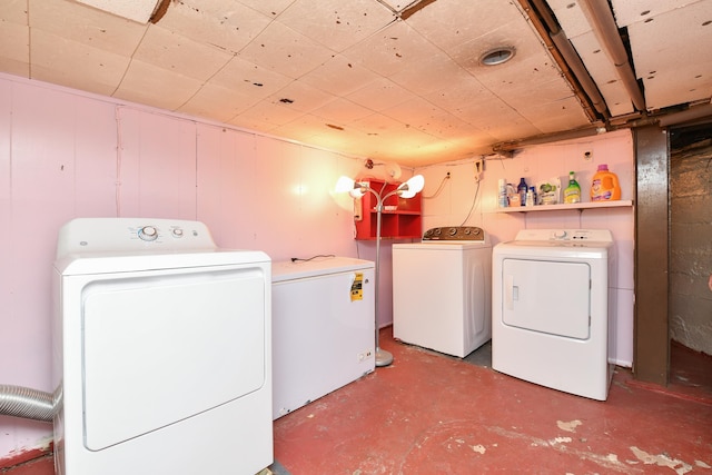 laundry area featuring laundry area and washer and dryer