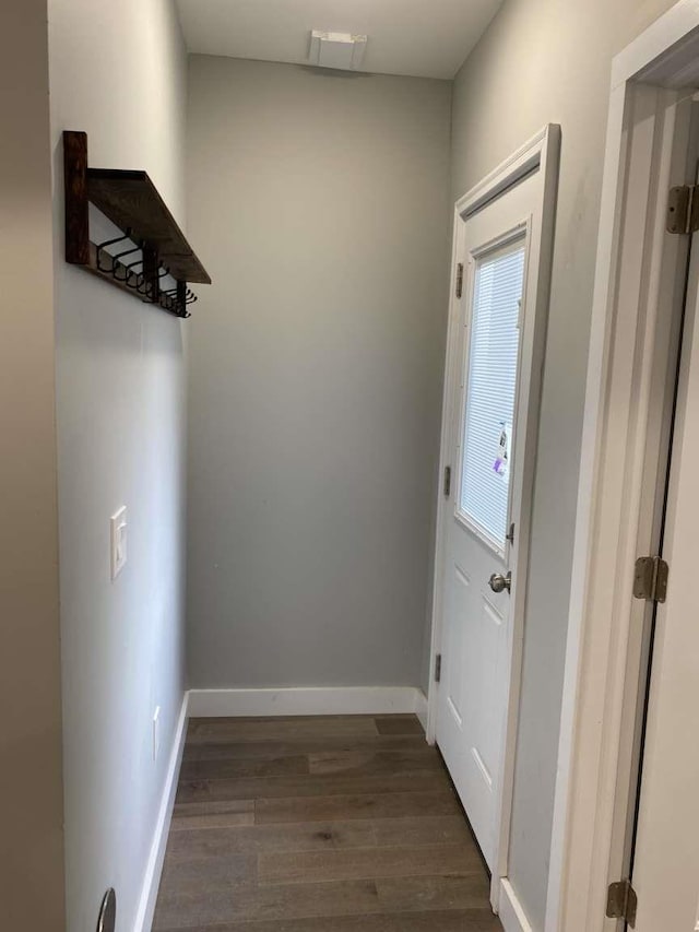 41 Beacon Ave Unit 1, Jersey City, NJ 07306 - hall featuring dark wood-style floors and baseboards