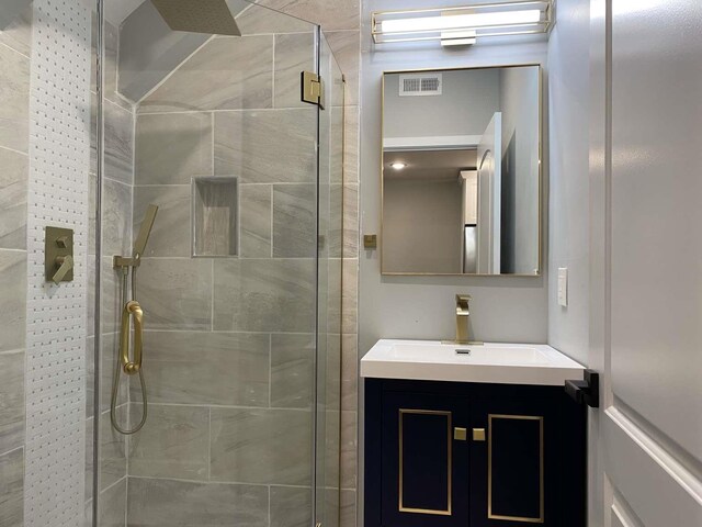 41 Beacon Ave Unit 1, Jersey City, NJ 07306 - full bathroom featuring a shower stall and vanity