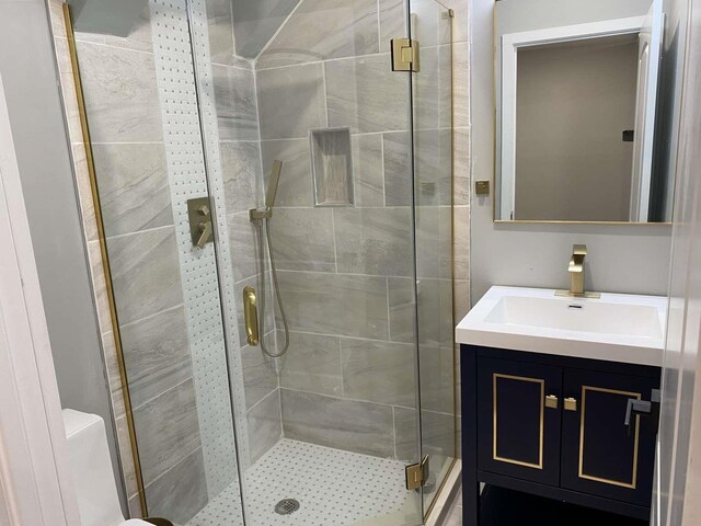 41 Beacon Ave Unit 1, Jersey City, NJ 07306 - bathroom with a stall shower and vanity
