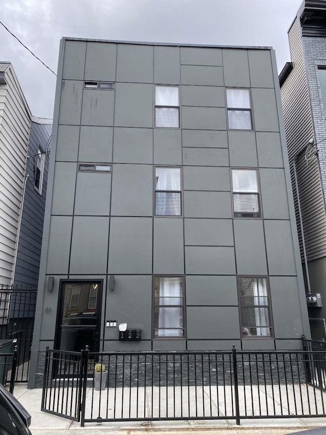 41 Beacon Ave Unit 1, Jersey City, NJ 07306 - view of property featuring fence