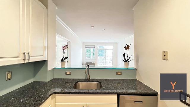1100 River Rd, Edgewater, NJ 07020 - kitchen featuring ornamental molding, white cabinetry, and dark stone countertops