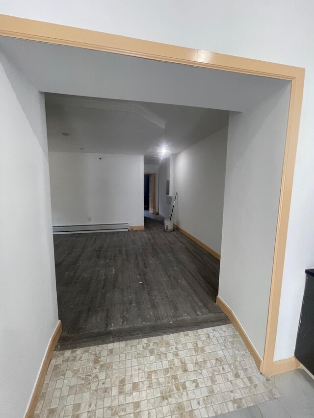 2907 Central Ave, Union City, NJ 07087 - finished below grade area with a baseboard heating unit and wood finished floors