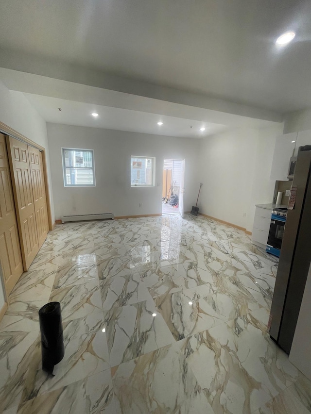 2907 Central Ave, Union City, NJ 07087 - unfurnished living room with recessed lighting and a baseboard radiator