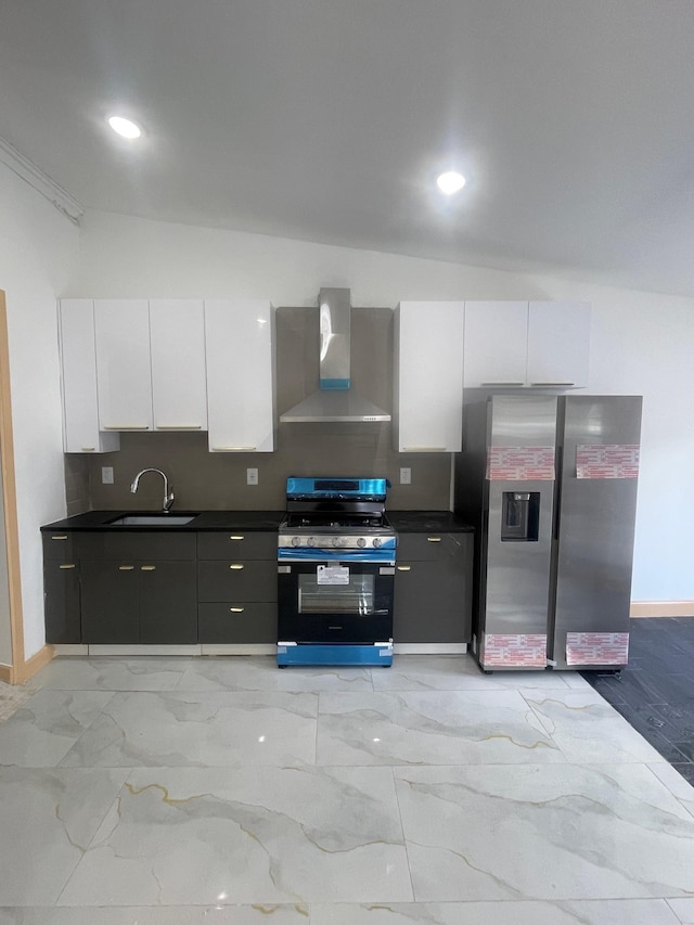 2907 Central Ave, Union City, NJ 07087 - kitchen featuring appliances with stainless steel finishes, wall chimney exhaust hood, dark countertops, white cabinetry, and recessed lighting