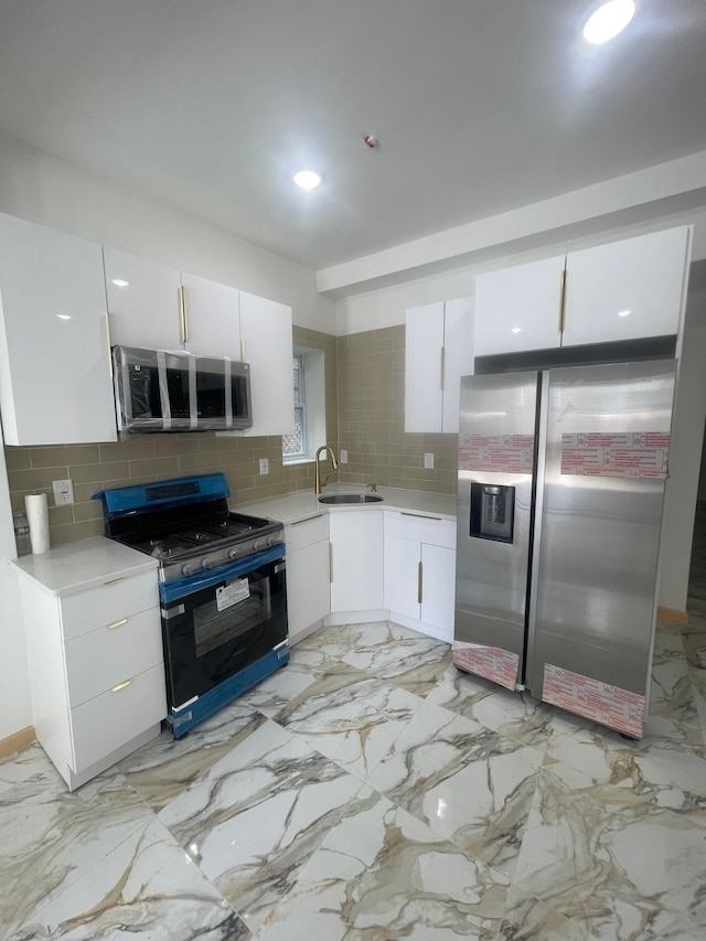 2907 Central Ave, Union City, NJ 07087 - kitchen featuring stainless steel appliances, light countertops, backsplash, and recessed lighting