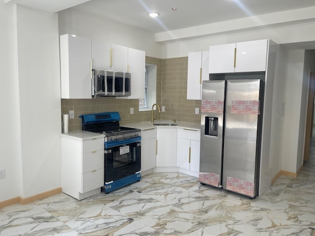 2907 Central Ave, Union City, NJ 07087 - kitchen featuring stainless steel appliances, light countertops, tasteful backsplash, white cabinets, and recessed lighting