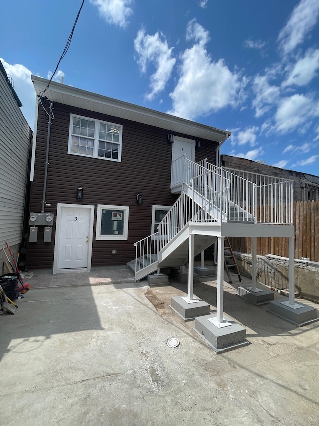 2907 Central Ave, Union City, NJ 07087 - rear view of house with stairway and a patio area