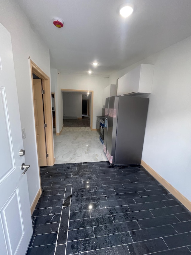 2907 Central Ave, Union City, NJ 07087 - kitchen featuring stainless steel fridge with ice dispenser and white cabinets